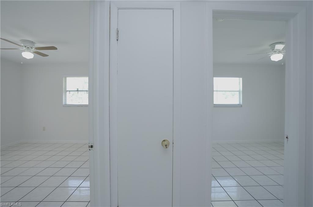 1195 South Alhambra Circle Naples, FL 34103 - Photo 14 of 34 a bathroom with a shower
