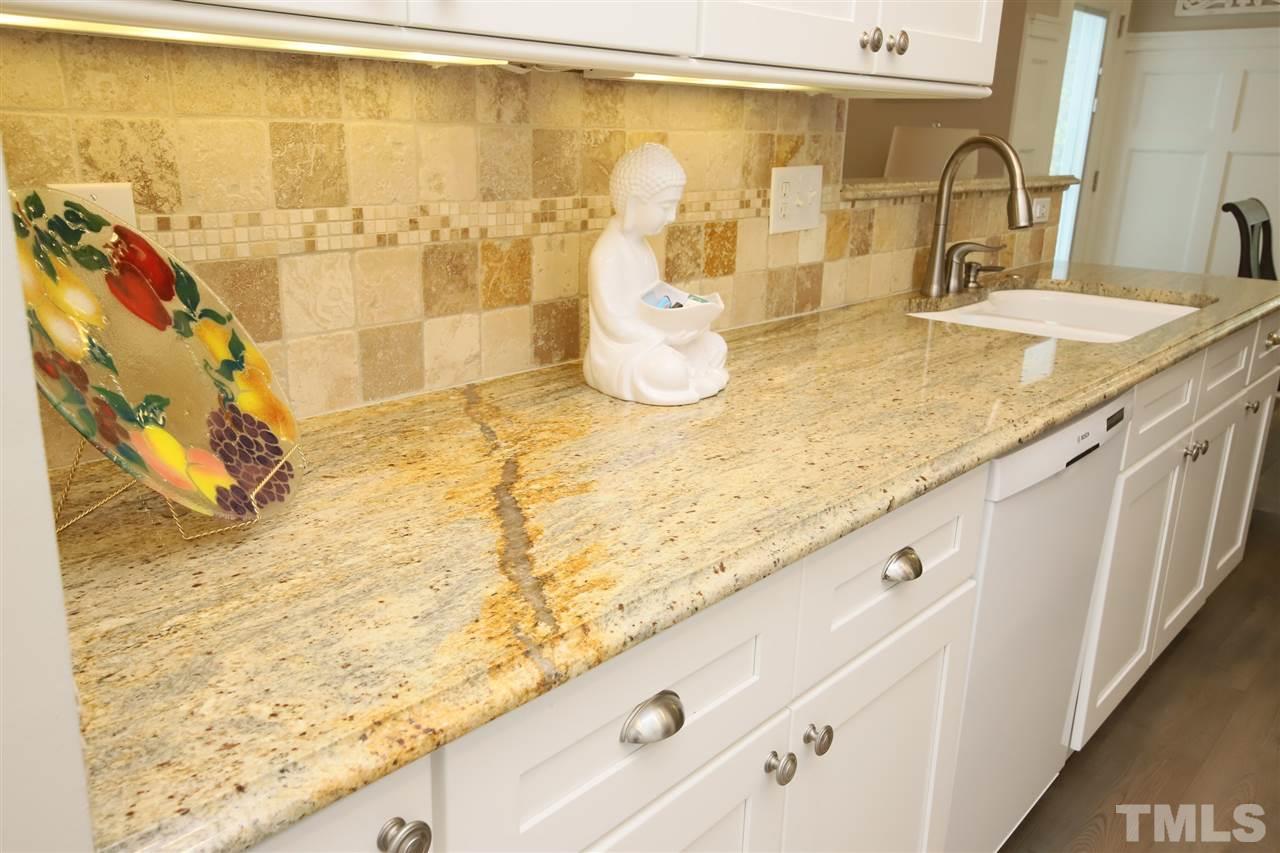2412 Pumpkin Ridge Way Raleigh, NC 27604 - Photo 14 of 30 Another angle of beautiful kitchen