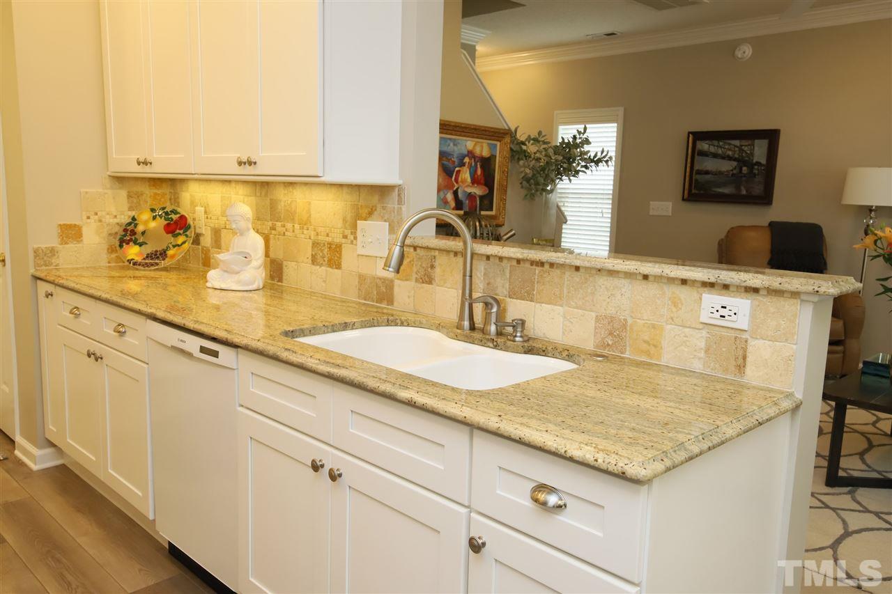 2412 Pumpkin Ridge Way Raleigh, NC 27604 - Photo 15 of 30 Another angle of Kitchen overlooking the fabulous living room