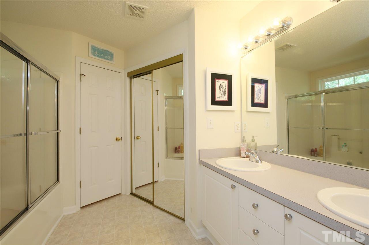 2412 Pumpkin Ridge Way Raleigh, NC 27604 - Photo 20 of 30 Large Master Bathroom with tub/shower, dual vanity and walk in closet