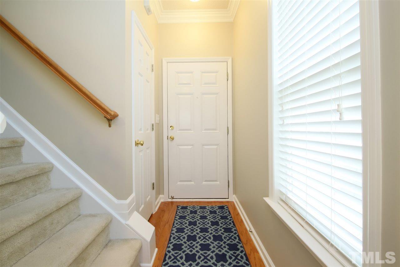 2412 Pumpkin Ridge Way Raleigh, NC 27604 - Photo 7 of 30 Nice foyer, front door with storm door