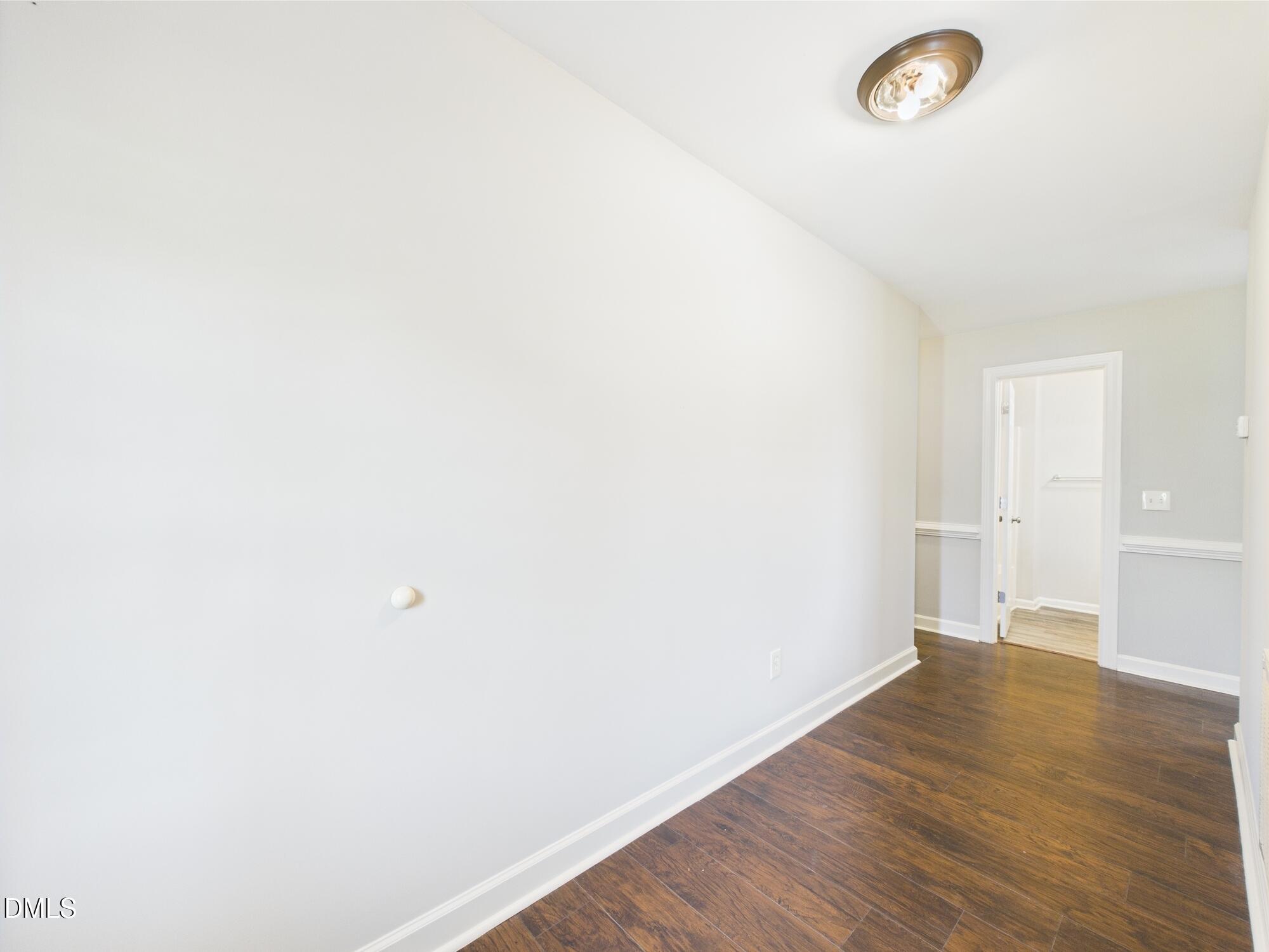 10917 Fanny Brown Road Raleigh, NC 27603 - Photo 10 of 54 a view of a room with wooden floor
