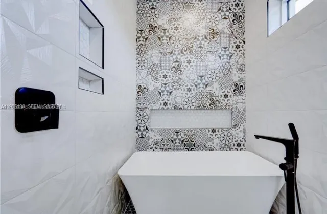 a bathroom with a bathtub