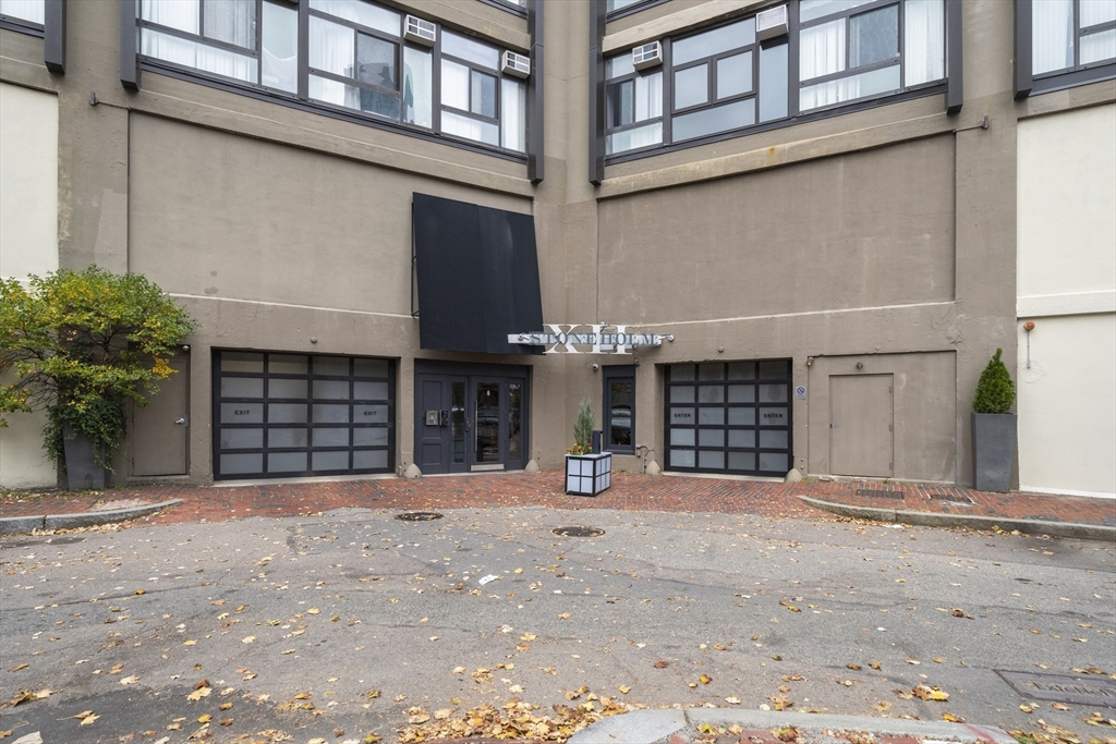 12 Stoneholm Street, Unit PKG:A Boston, MA 02115 - Photo 8 of 10 a view of an house with a outdoor space