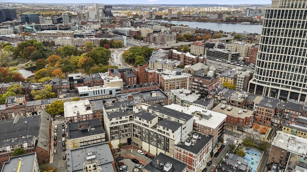 12 Stoneholm Street, Unit PKG:A Boston, MA 02115 - Photo 10 of 10 an aerial view of a city with streets and houses