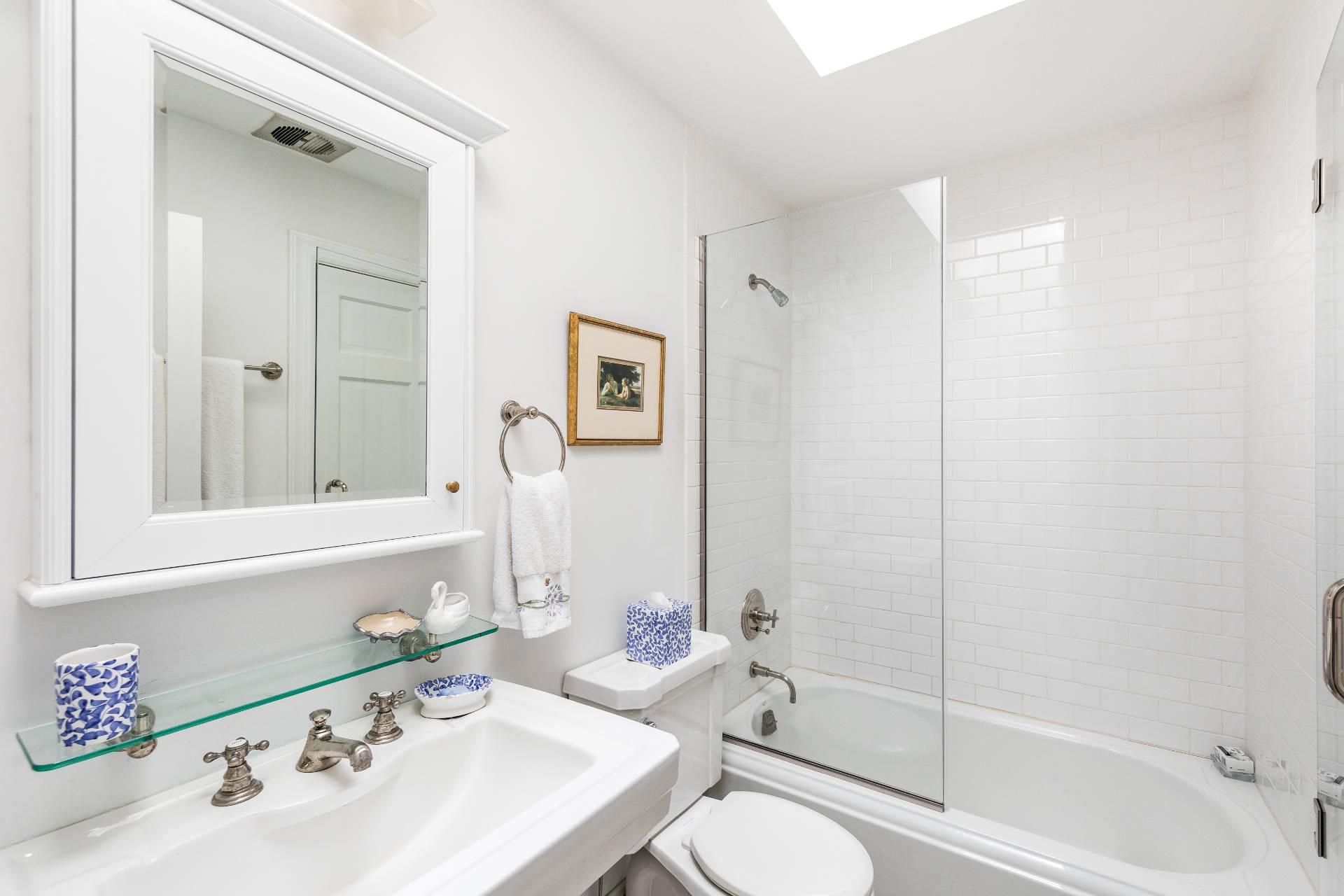 24 Audubon Avenue Bridgehampton, NY 11932 - Photo 11 of 13 a bathroom with a sink a toilet and shower