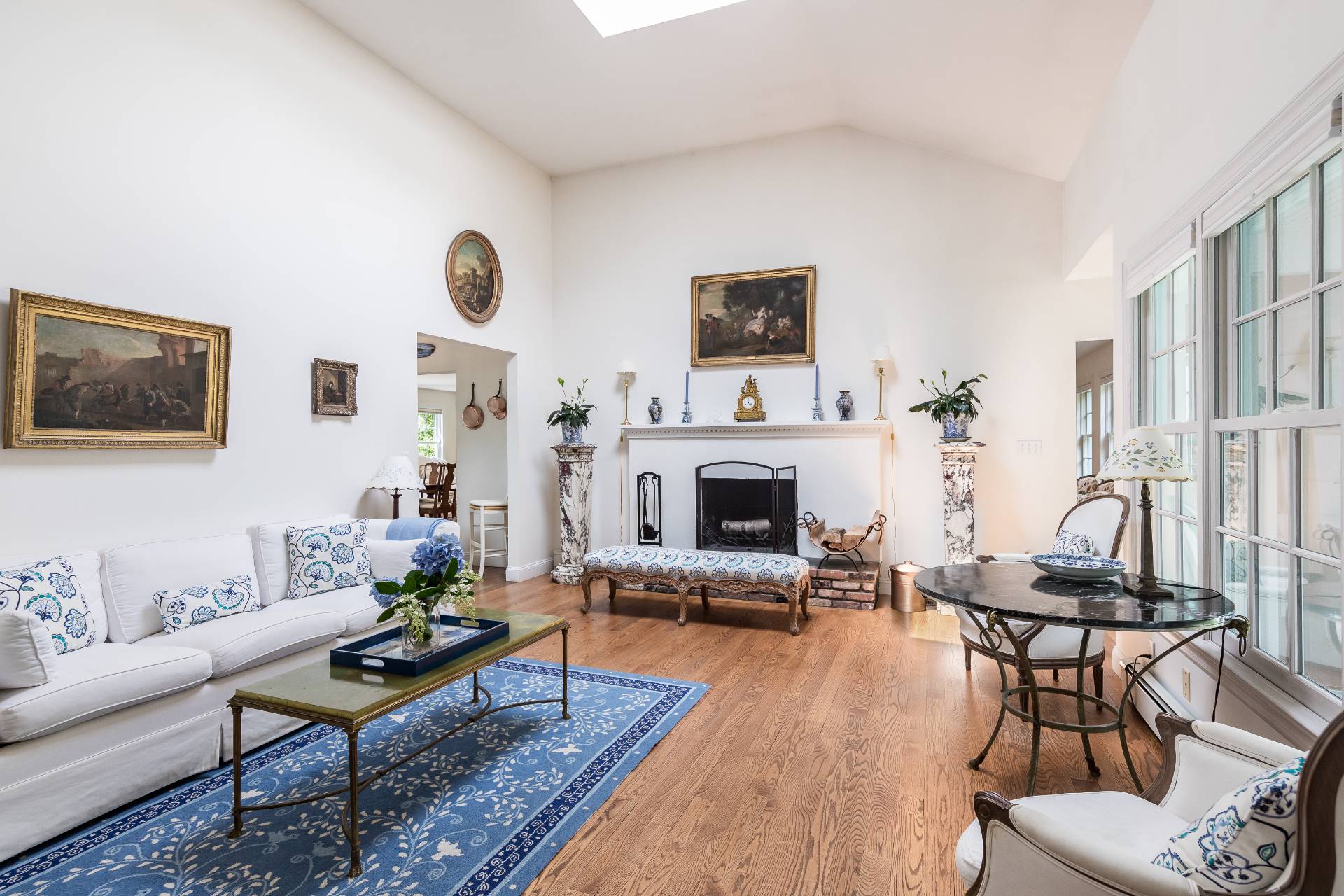 24 Audubon Avenue Bridgehampton, NY 11932 - Photo 5 of 13 a living room with furniture a fireplace and a flat screen tv