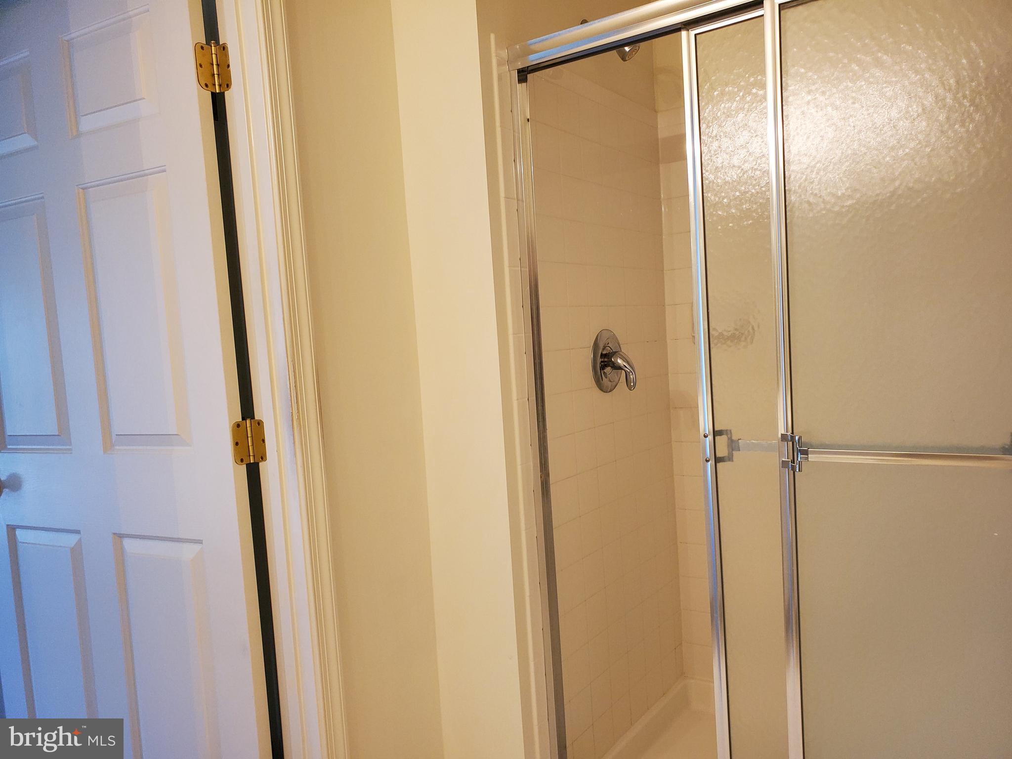 9600 Haven Farm Road, Unit F Perry Hall, MD 21128 - Photo 21 of 36 Master Bathroom Easy Step-In Shower