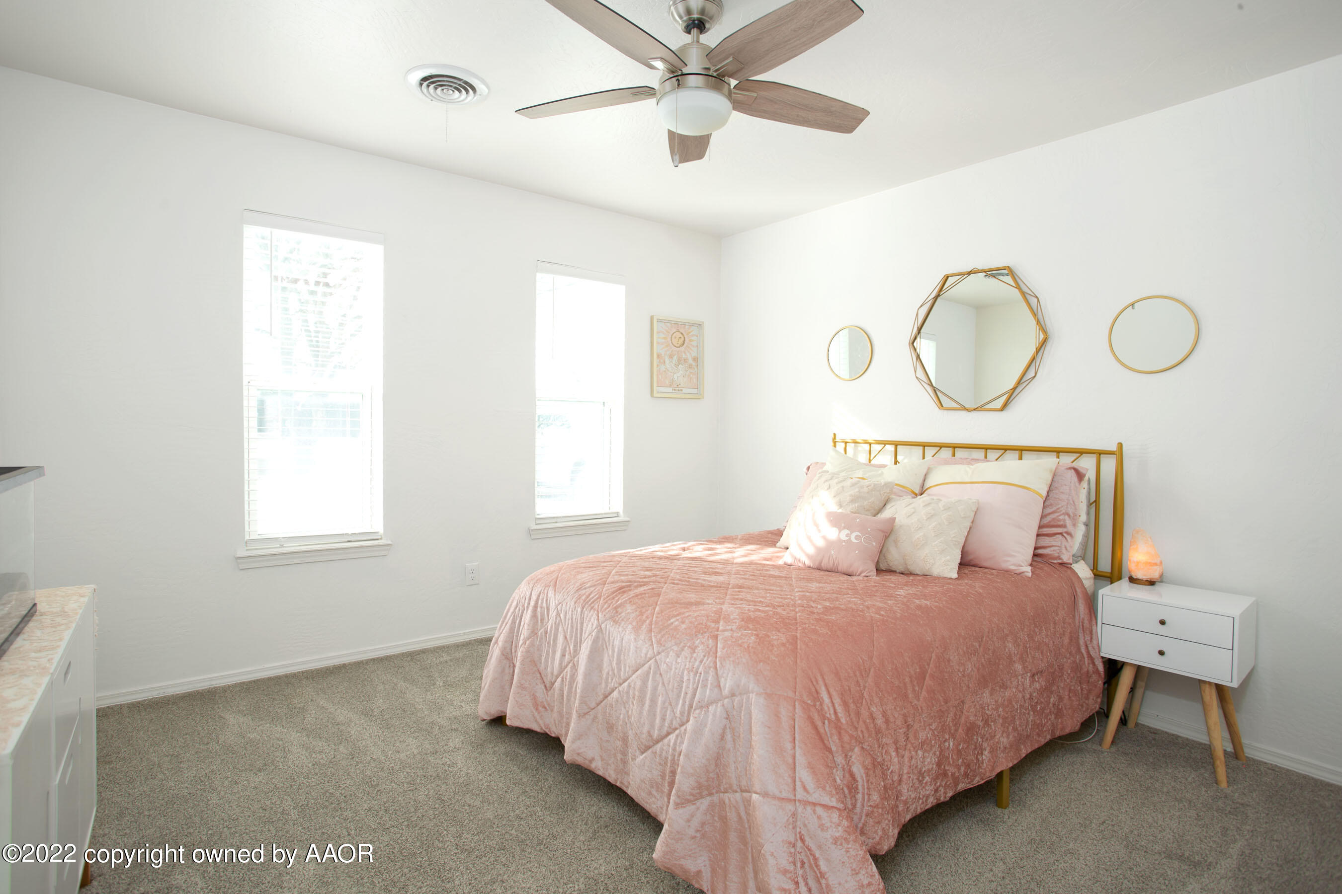 5104 Red Oak Drive Amarillo, TX 79110 - Photo 11 of 19 a bedroom with a bed and window