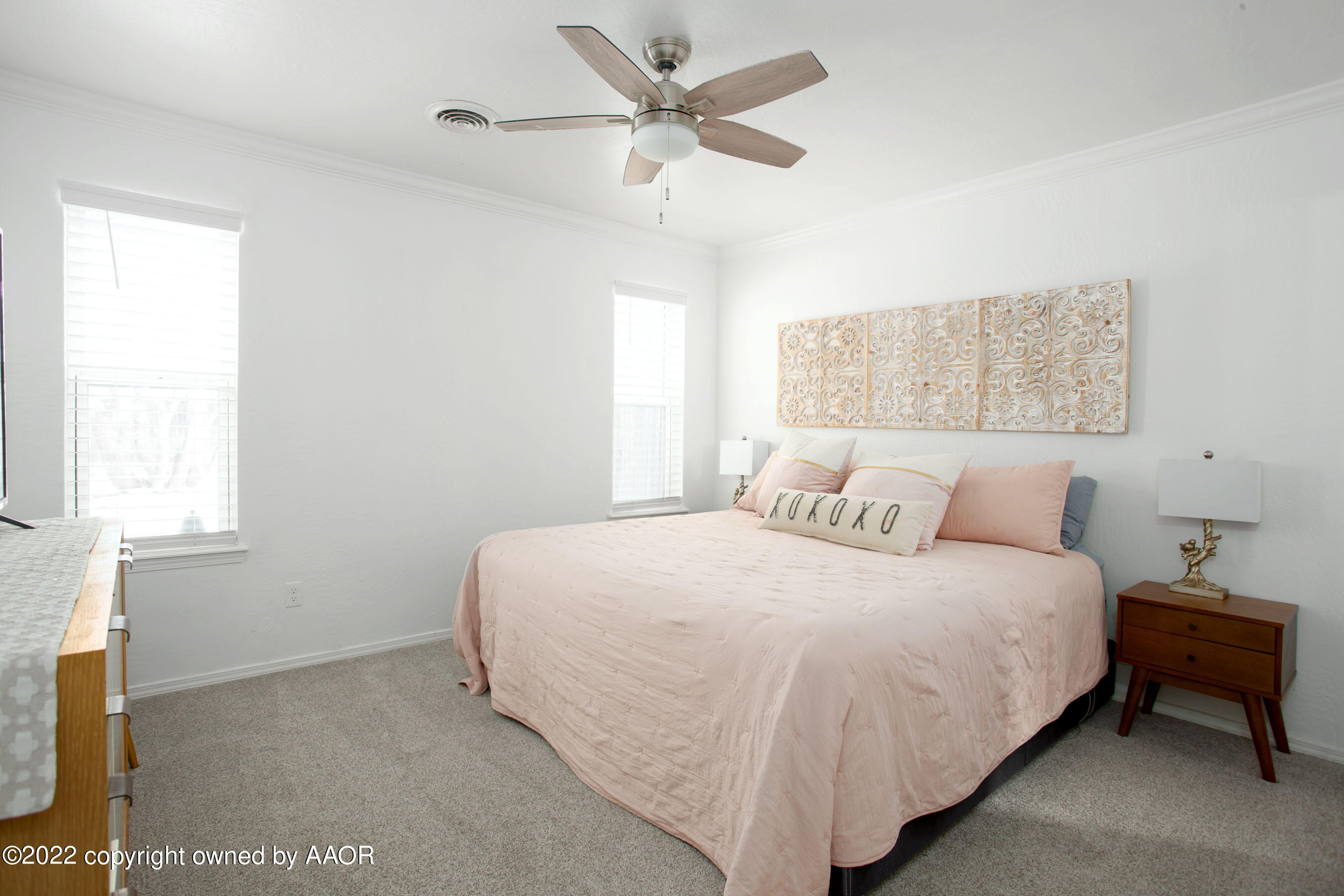 5104 Red Oak Drive Amarillo, TX 79110 - Photo 8 of 19 a bedroom with a bed and a window