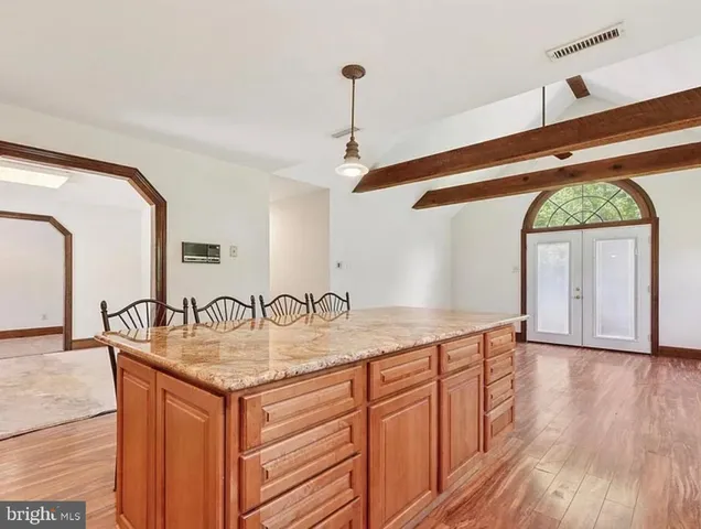 a kitchen with sink and window