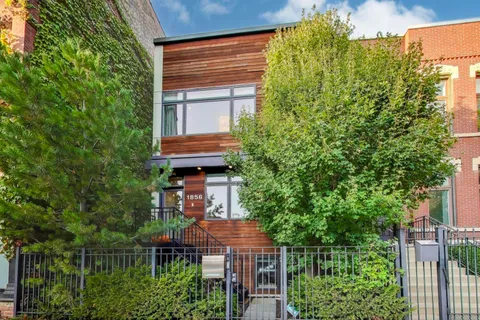 a house view with a garden space