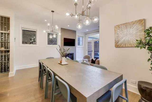 a bathroom with a sink mirror and toilet