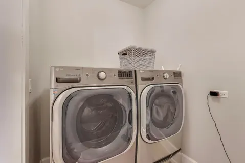 a view of balcony with furniture