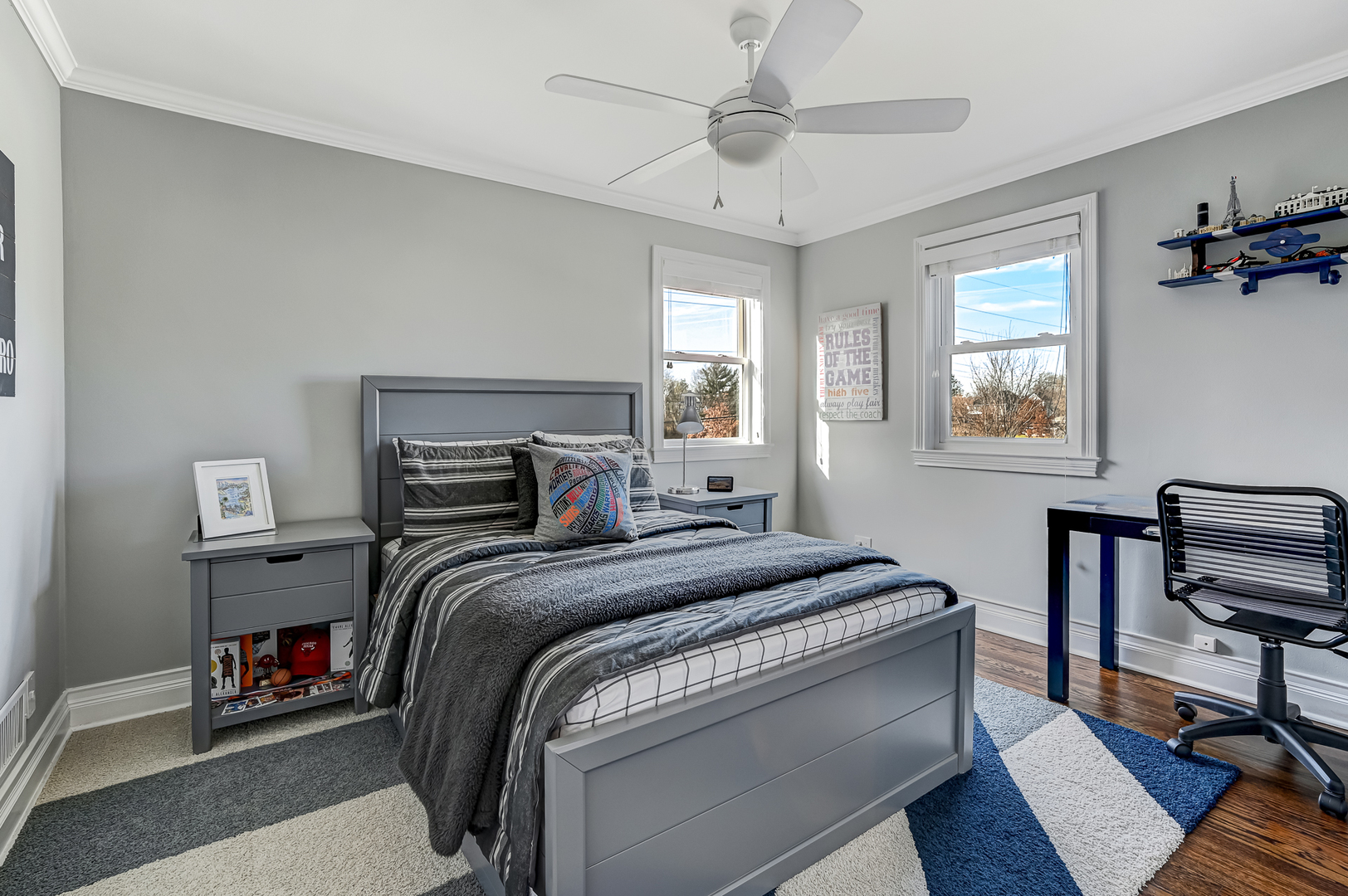 447 Ridge Avenue Clarendon Hills, IL 60514 - Photo 23 of 39 a bedroom with a bed a books bucket with a desk and chair