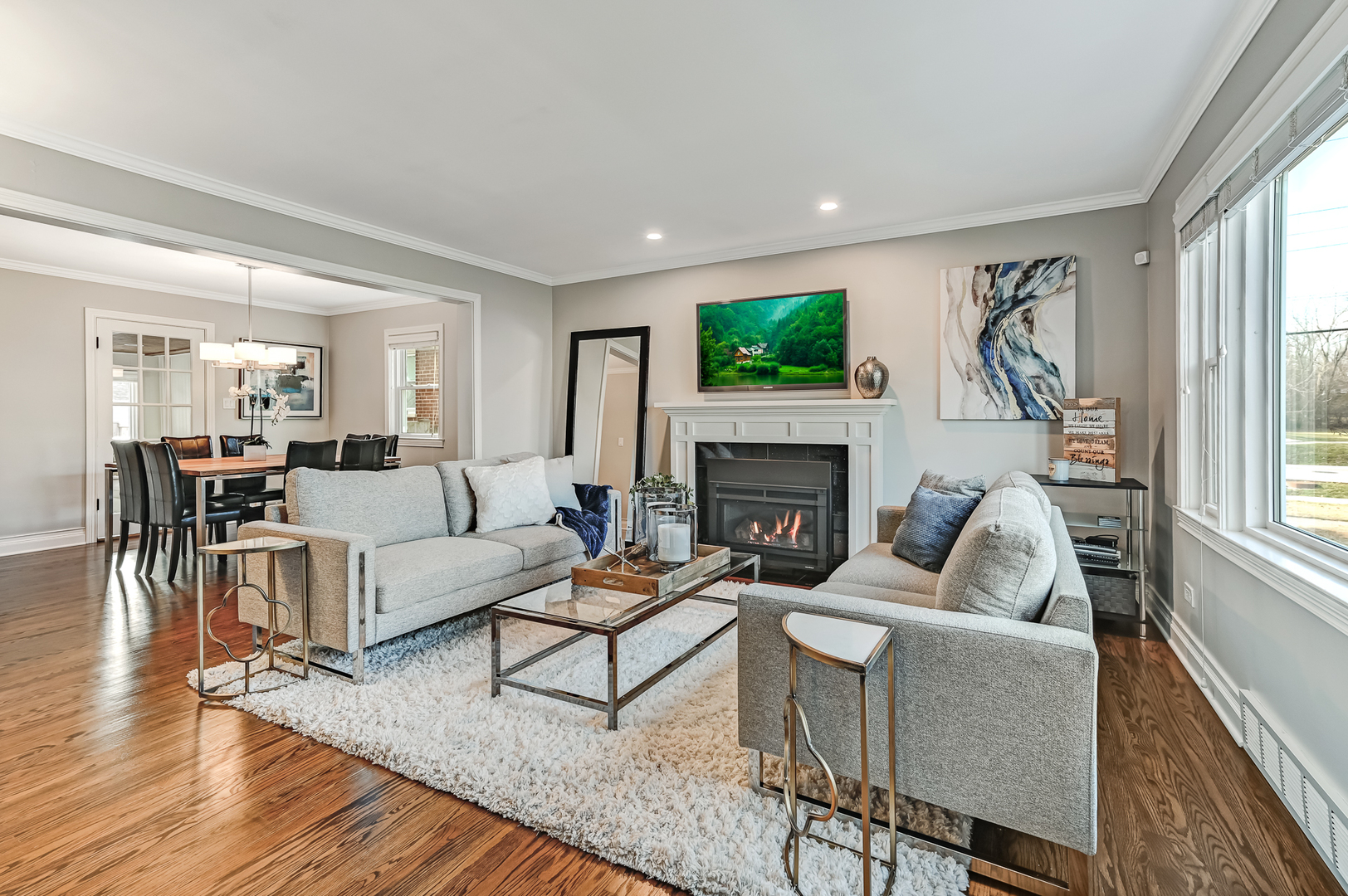 447 Ridge Avenue Clarendon Hills, IL 60514 - Photo 3 of 39 a living room with furniture and a fireplace