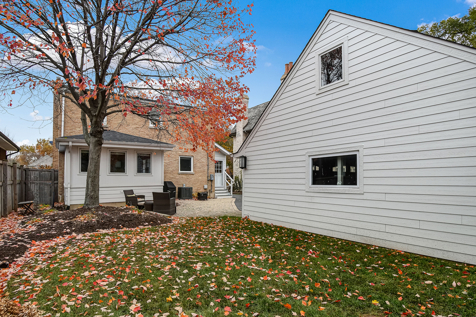 447 Ridge Avenue Clarendon Hills, IL 60514 - Photo 35 of 39 a view of a house with a patio