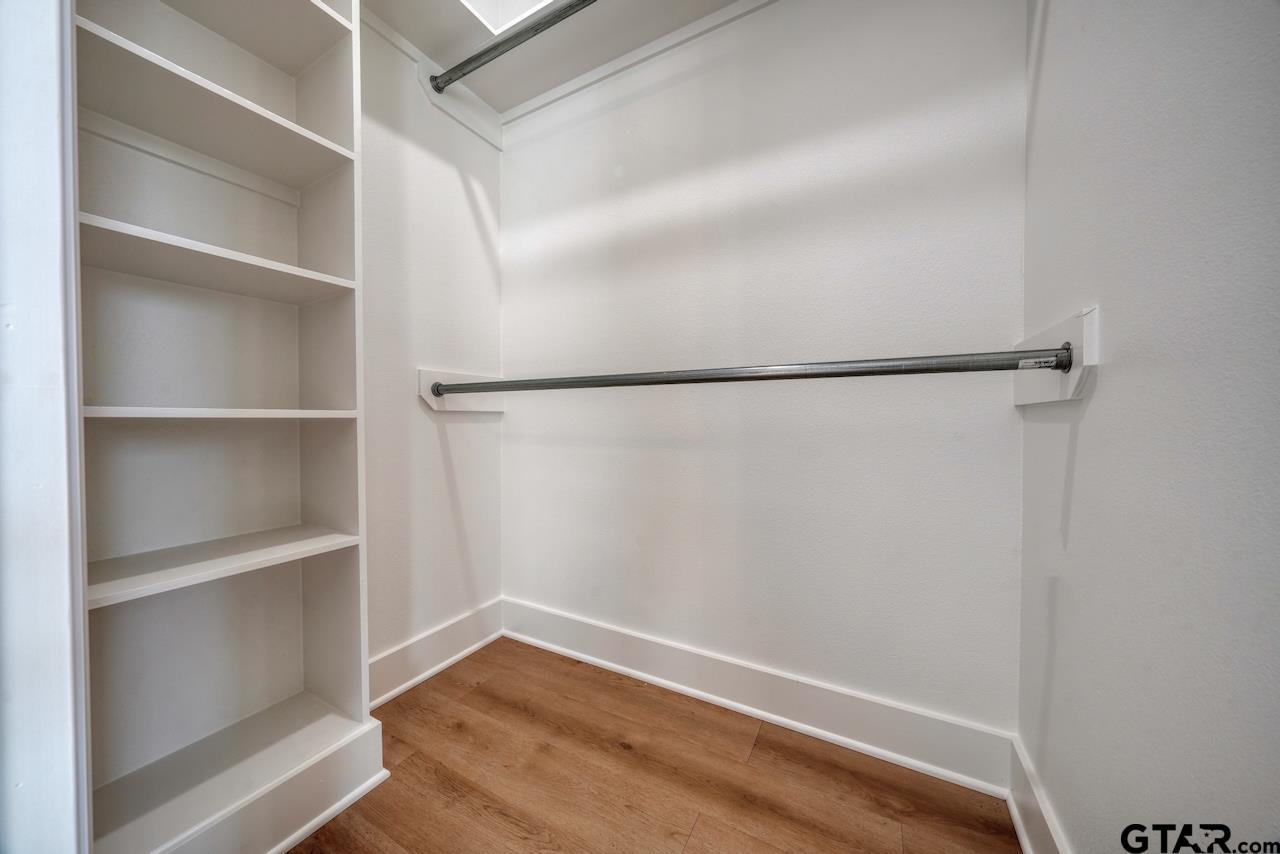 636 Prince Lane Tyler, TX 75704 - Photo 24 of 38 a view of an empty walk in closet
