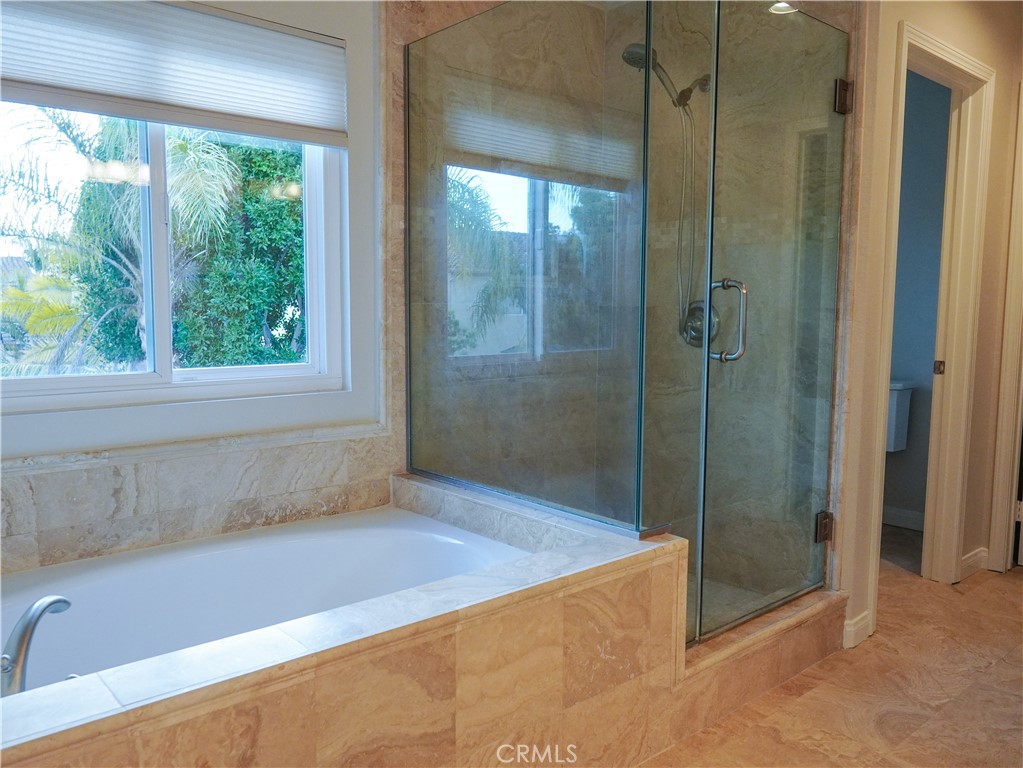 26 Colorado Irvine, CA 92606 - Photo 13 of 26 a bathroom with a bathtub and shower