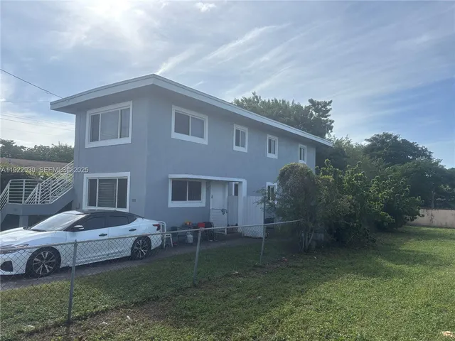 a house view with a garden space