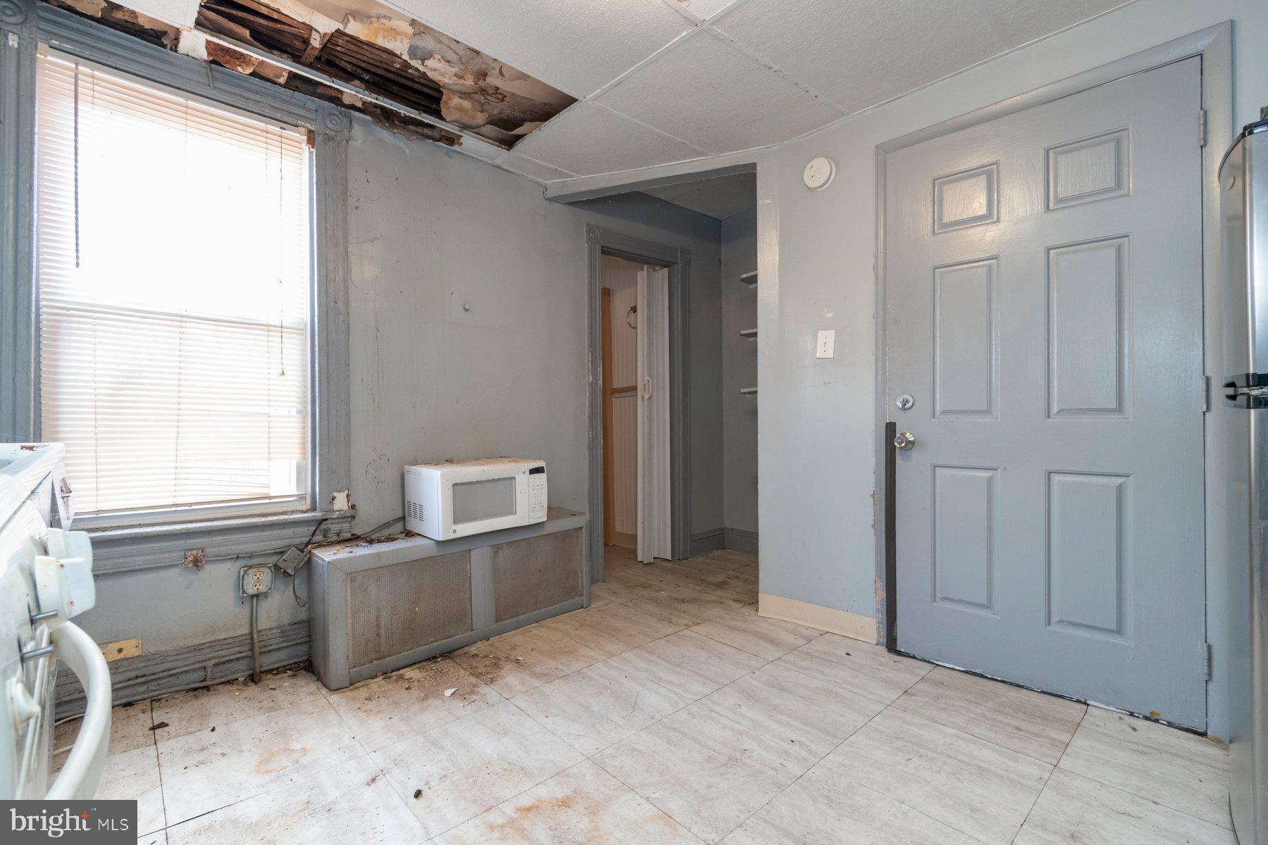 2273 Reisterstown Road Baltimore, MD 21217 - Photo 17 of 27 a view of a furniture and window in a room