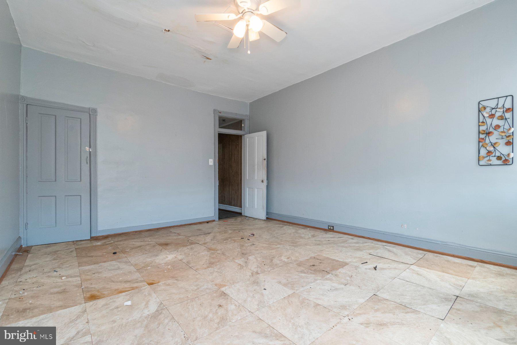 2273 Reisterstown Road Baltimore, MD 21217 - Photo 27 of 27 a view of an empty room with a chandelier fan