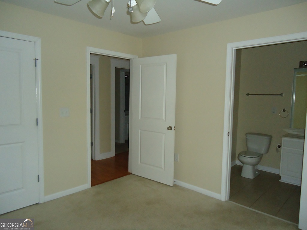 1035 South Barnett Shoals Road, Unit 1012 Athens, GA 30605 - Photo 17 of 27 a bathroom view of a toilet and a sink