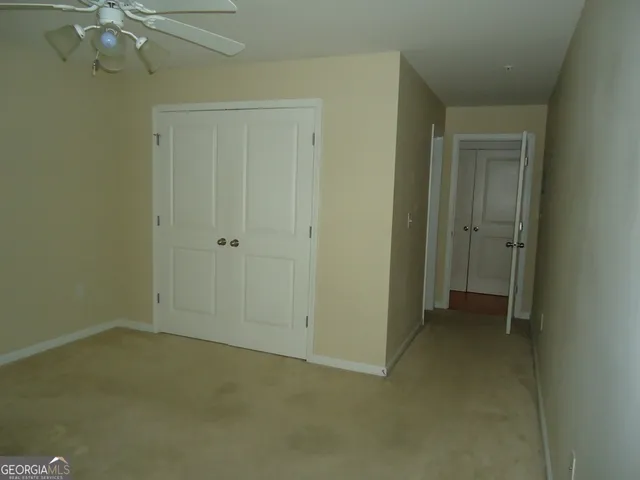 an empty room with a bathroom