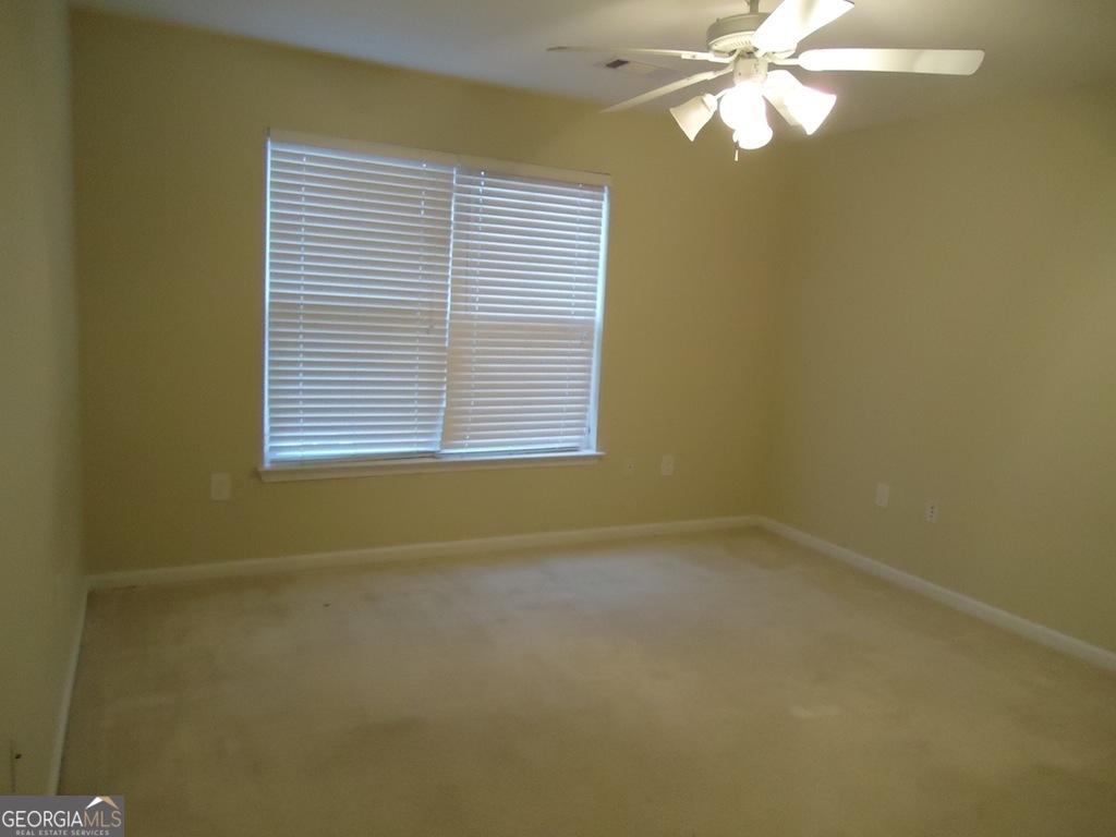 1035 South Barnett Shoals Road, Unit 1012 Athens, GA 30605 - Photo 26 of 27 a view of an empty room with a window