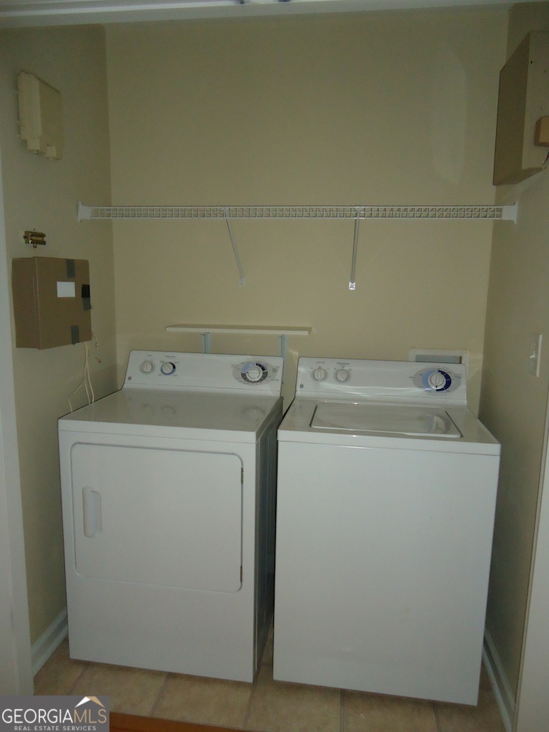 1035 South Barnett Shoals Road, Unit 1012 Athens, GA 30605 - Photo 27 of 27 a utility room with dryer and washer