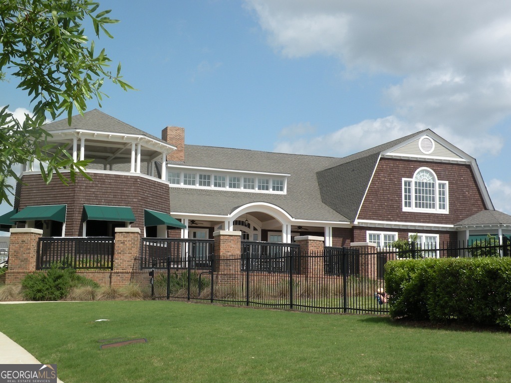 1035 South Barnett Shoals Road, Unit 1012 Athens, GA 30605 - Photo 3 of 27 a front view of house with yard and green space