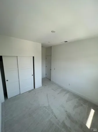 an empty room with a natural light