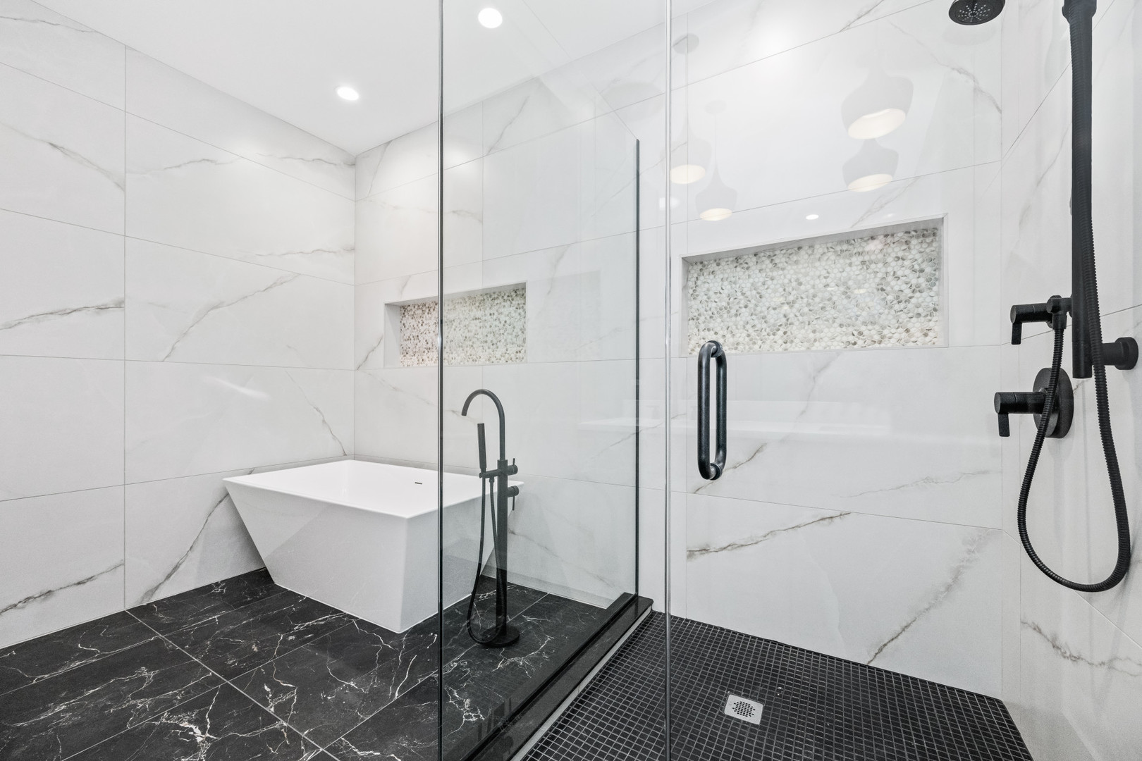 7827 South Merrill Avenue Chicago, IL 60649 - Photo 24 of 42 a bathroom with a sink a toilet and shower