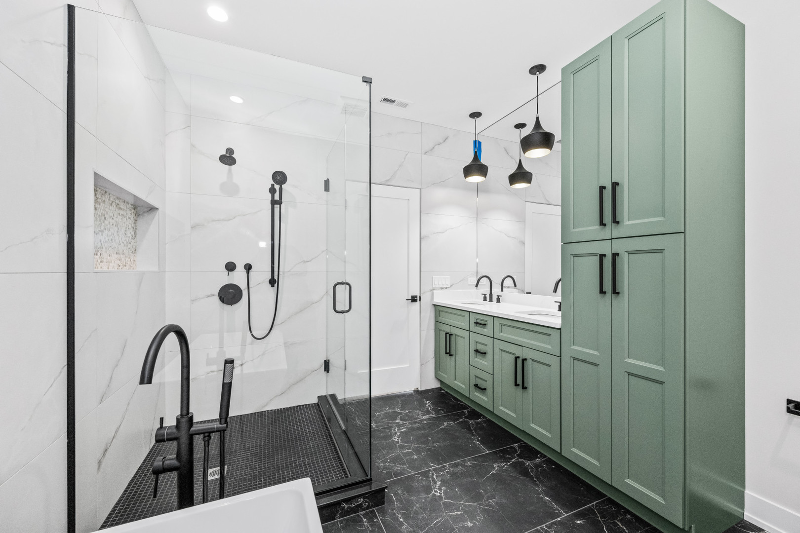 7827 South Merrill Avenue Chicago, IL 60649 - Photo 25 of 42 a spacious bathroom with shower glass door and a sink