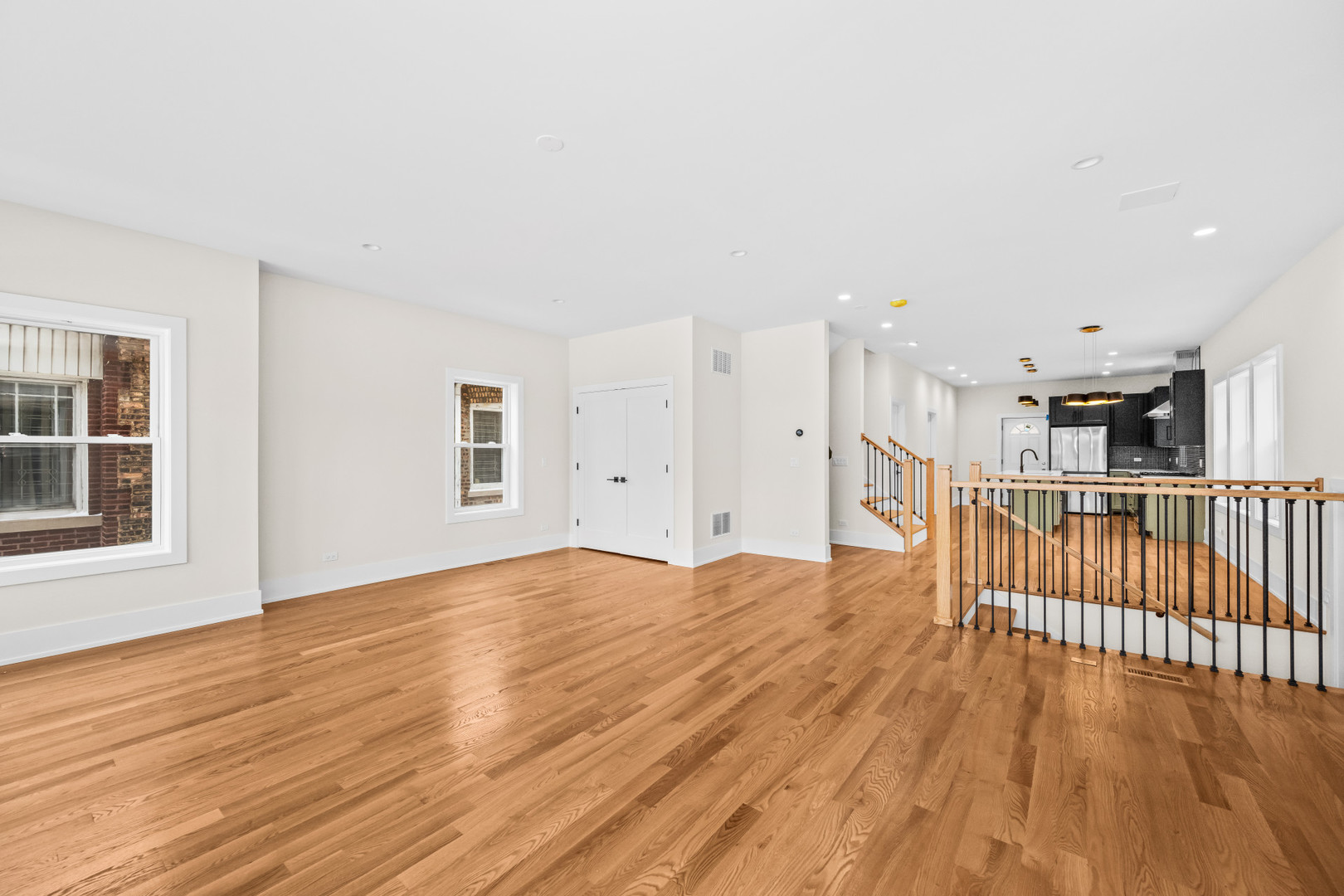 7827 South Merrill Avenue Chicago, IL 60649 - Photo 6 of 42 a view of empty room with wooden floor