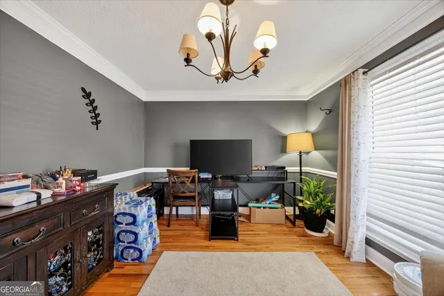 a view of a workspace with furniture