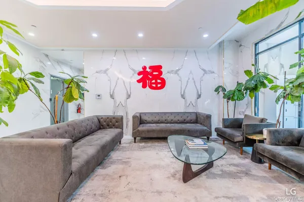 a living room with furniture and a couch