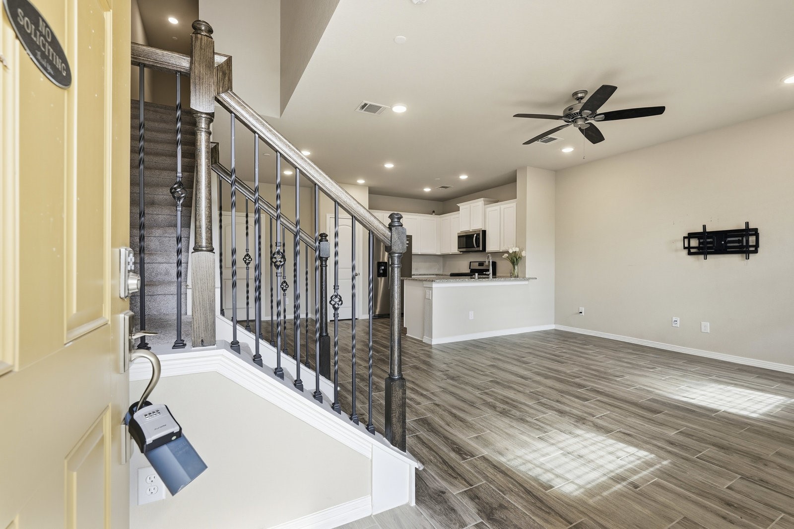 8038 Scanlan Trace Missouri City, TX 77459 - Photo 3 of 25 a view of a living room and a ceiling fan