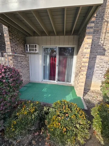 a view of a backyard with garden