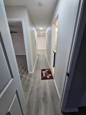 a view of entryway with wooden floor
