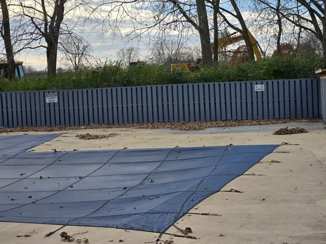 a view of wooden floor with a wooden fence