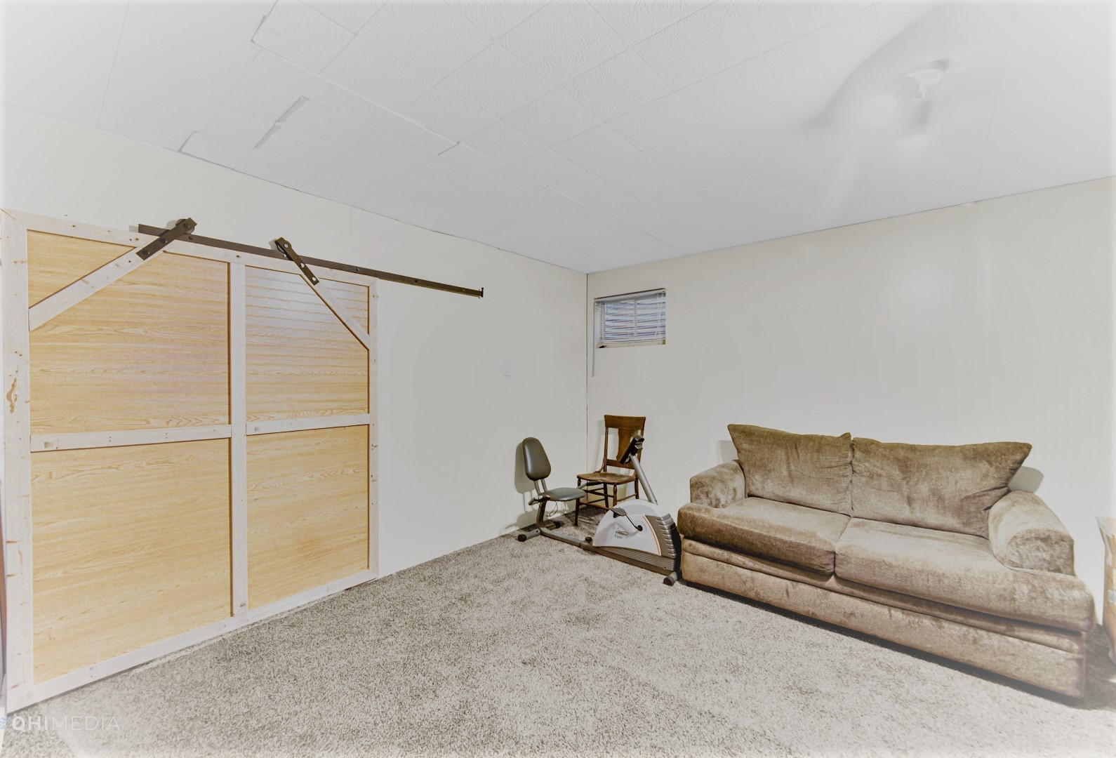 511 Davidson Drive, Unit B Minooka, IL 60447 - Photo 10 of 10 a living room with furniture and a window