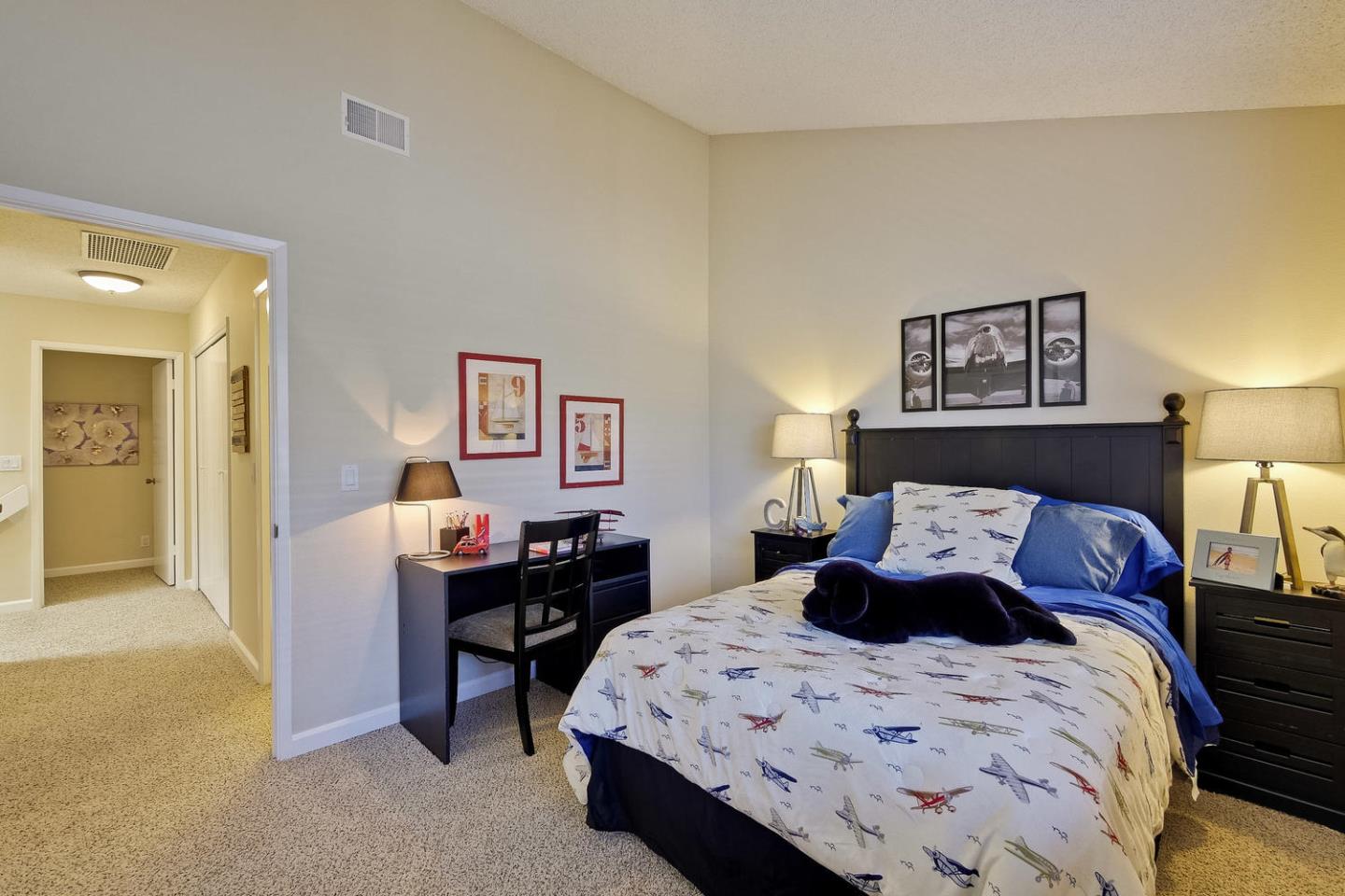 96 Redding Road Campbell, CA 95008 - Photo 36 of 52 a bedroom with a bed and a table in it