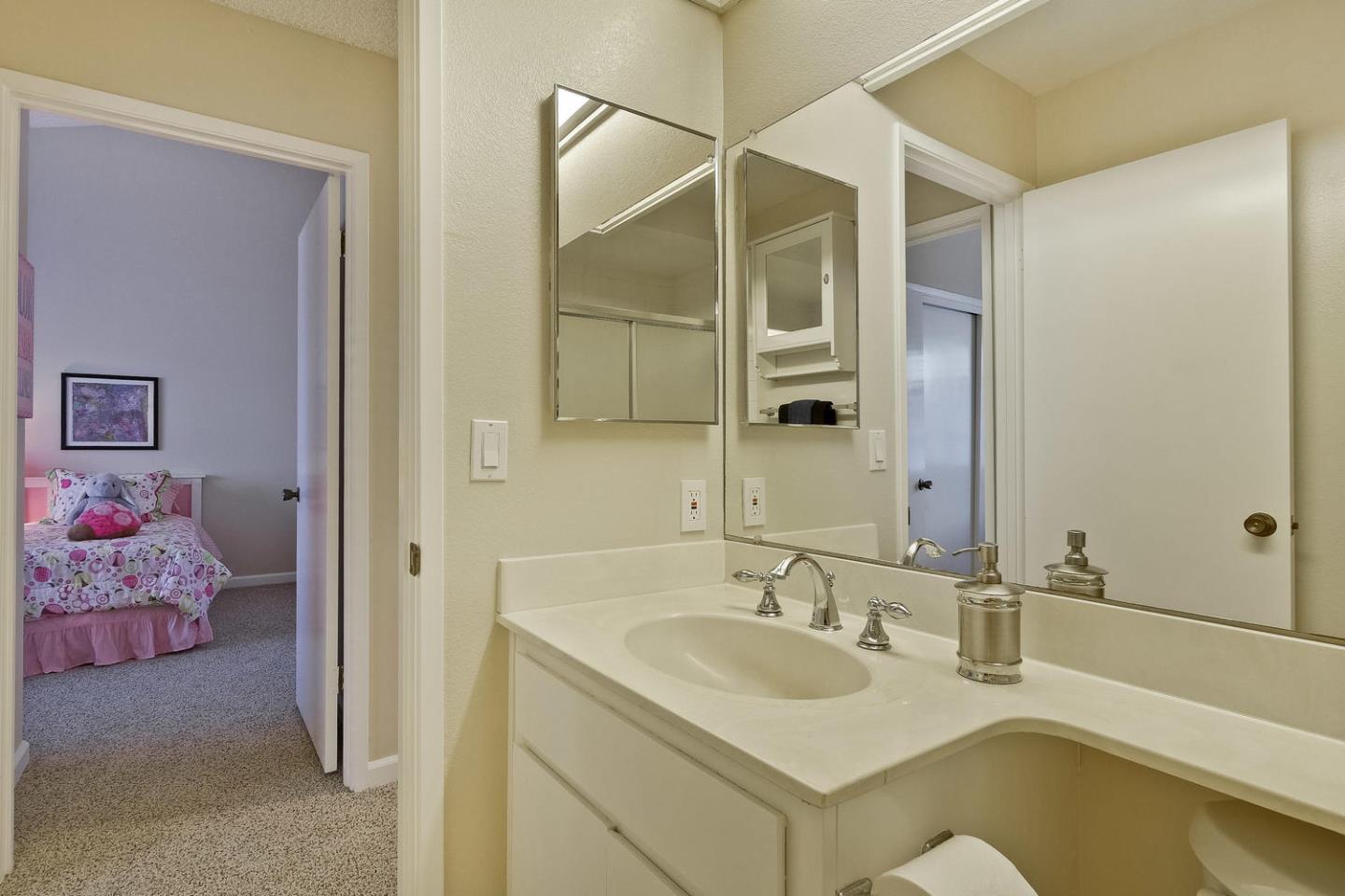 96 Redding Road Campbell, CA 95008 - Photo 42 of 52 a bathroom with a sink and a mirror