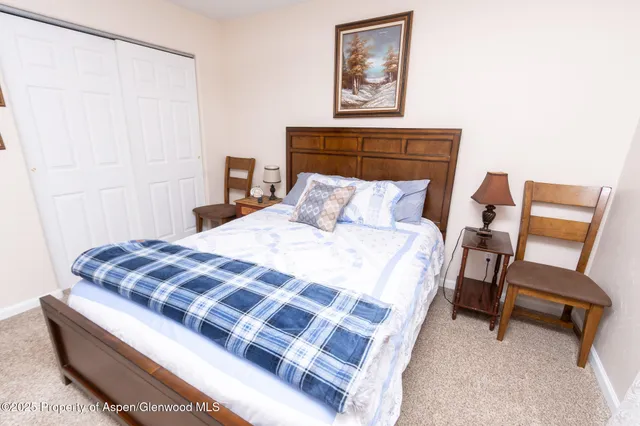 a close view of a utility room with dryer and washer