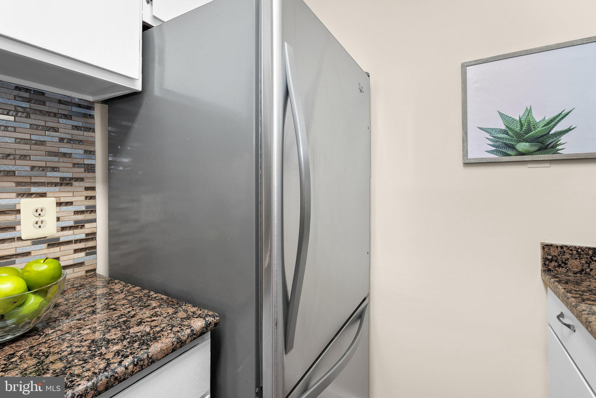 3222 Cherry Hill Lane, Unit B2 Washington, DC 20007 - Photo 18 of 30 a bathroom with a granite countertop sink and a mirror