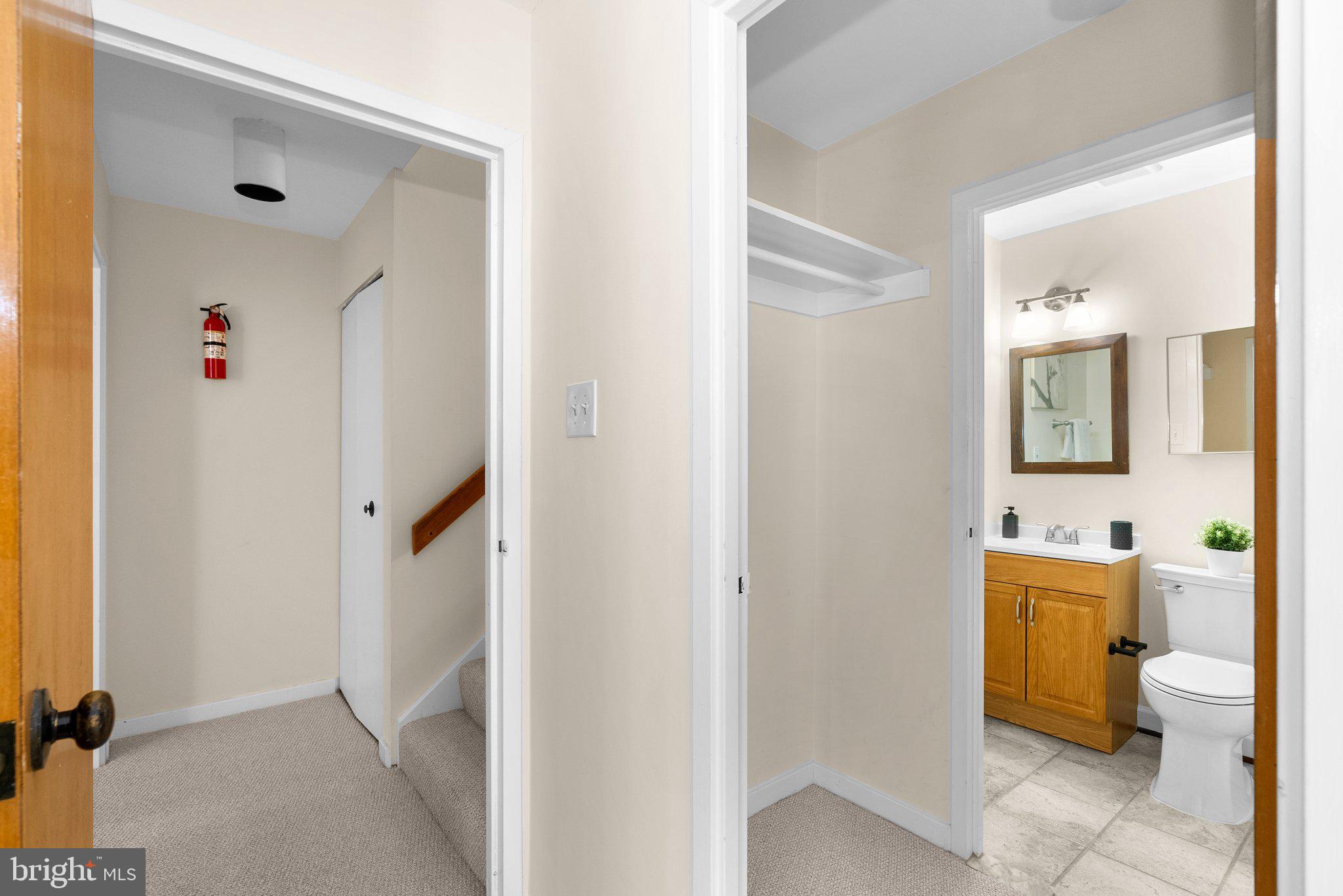 3222 Cherry Hill Lane, Unit B2 Washington, DC 20007 - Photo 20 of 30 a en suite bathroom with a toilet sink and mirror