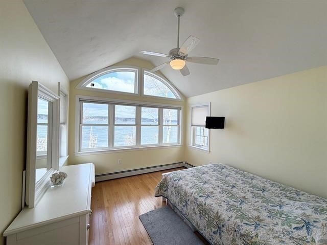 144 Lake Street, Unit 11 Laconia, NH 03246 - Photo 22 of 38 a bedroom with a bed and a window