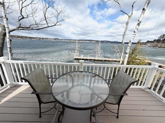 144 Lake Street, Unit 11 Laconia, NH 03246 - Photo 9 of 38 a view of a balcony with furniture