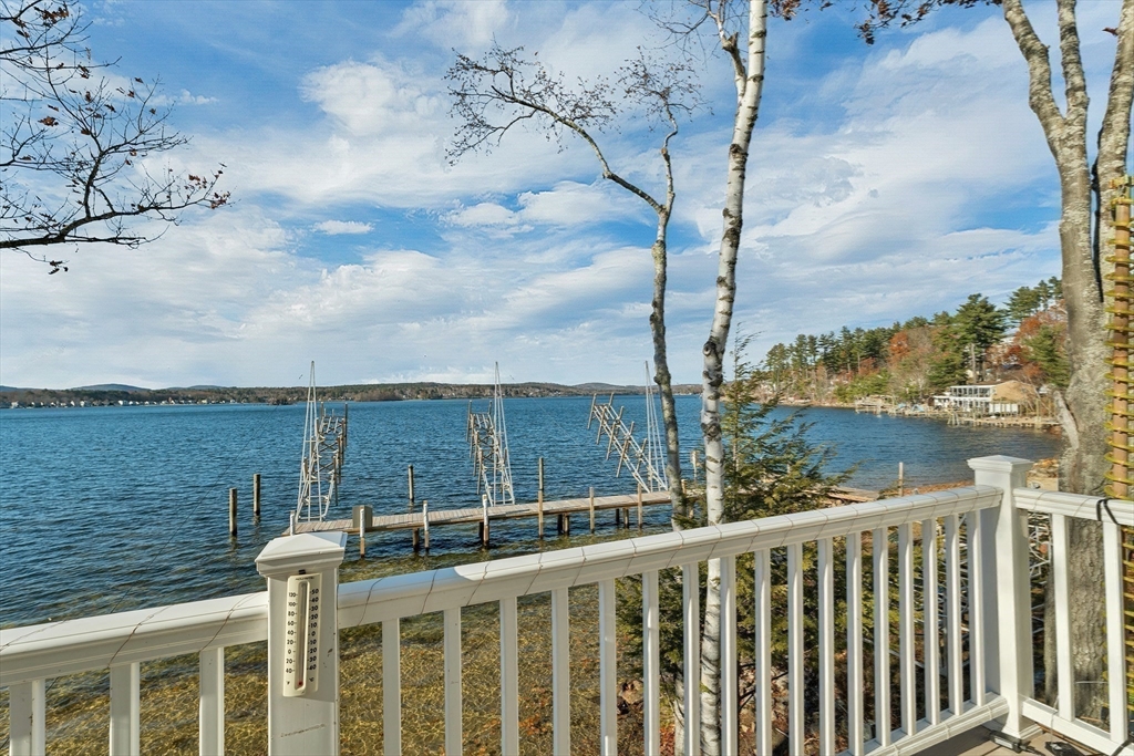 144 Lake Street, Unit 11 Laconia, NH 03246 - Photo 10 of 38 a view of a lake from a balcony
